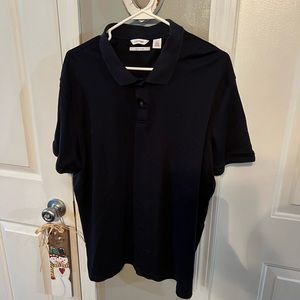 Navy Blue Calvin Klein polo. Size XL. Very cool feel.